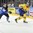COLOGNE, GERMANY - MAY 20: Sweden's Oscar Lindberg #15 passes the puck by Finland's Juuso Hietanen #38 during semifinal round action at the 2017 IIHF Ice Hockey World Championship. (Photo by Matt Zambonin/HHOF-IIHF Images)

